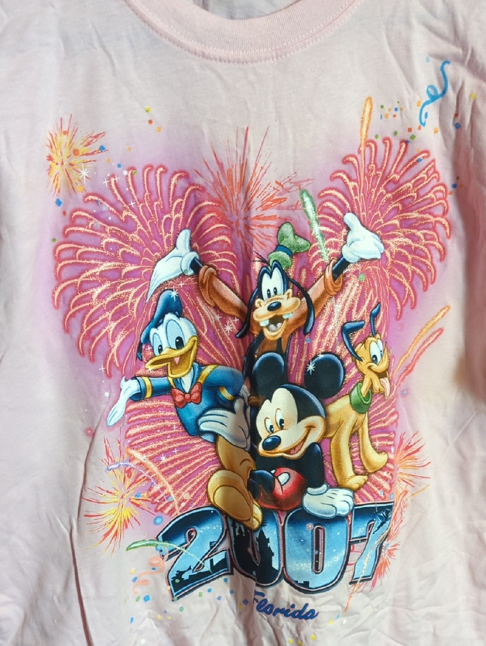 Disney Light Pink ’ Mickey & Friends Fireworks Graphic Tee. 2007. New. Large.Sal